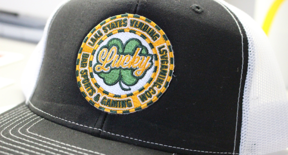 Full Color Woven Patch on black mesh hat